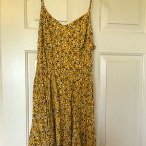 mustard yellow spaghetti strap floral mini dress.